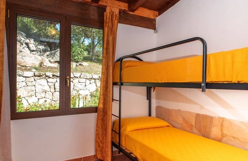 Telti Apartment | Nice apartment for 6 guests with pool, WIFI, TV, patio, pets allowed and parking