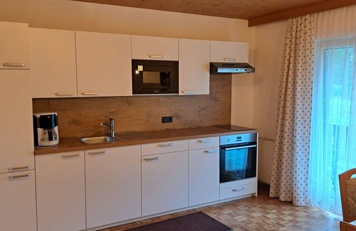 Oberwang Villa | Nice apartment in villa for 5 guests with WIFI, TV and balcony