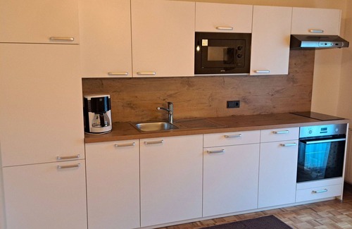 Oberwang Villa | Nice apartment in villa for 5 guests with WIFI, TV and balcony