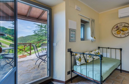 Castagneto Carducci Villa | Nice apartment in villa for 5 guests with pool, WIFI, A/C, patio and pets allowed