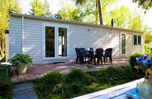 Noordoostelijk van Schaarsbergen House | Nice apartment in villa for 4 guests with pool, WIFI, TV, terrace and parking