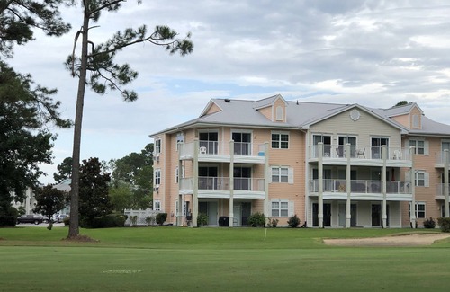 Calabash Apartment | Nice apartment with golf course view in prestigious Brunswick Golf. Fits 4.