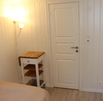 Oslo Apartment | Nice Apartment with1 bedroom Separate living room with a sofa bed and a tiny kitchen a bathroom located in Nordstrand near by the Sea for 3 guests with a garden and grill with sea view just outside the apartment