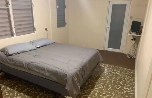 Mayaguez Pueblo House | Nice House near University of Mayaguez with covered and gated car parking.