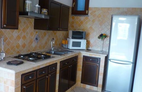 Pula Apartment | Nice two-room apartment with large garden with green lawn and vegetation