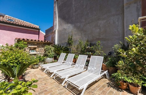 City Center Apartment | Nicely and romantic decorated Belle epoque suite with terrace, Wifi, sauna and bikes .