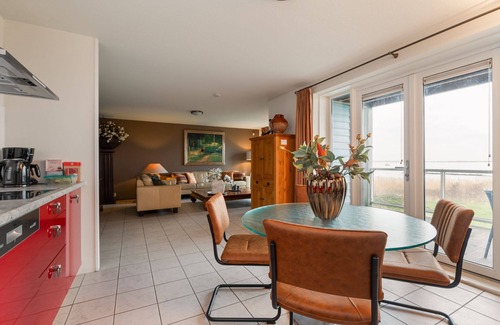 Municipality of Hellevoetsluis Apartment | Nicely furnished 4-pers. apartment with unique harbor view located at Cape Helius holiday park.