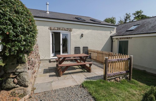 Capel Coch Cottage | NO 4 THE SHIPPON, pet friendly, with open fire in Llannerch-Y-Medd