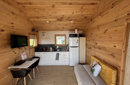 Mangonui Cabin | No other quite like it! Waterfront private cabin stay.