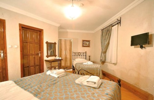 Goreme House | Nomads - Triple Room at the heart of Cappadocia