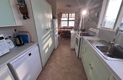 Waihi Beach House | North-End Beach Bach - Family charmer, amazing views, moments from the water.