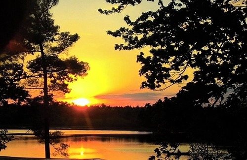 Iola Apartment | North Lake has great fishing, swimming and sunsets! This is an apartment.