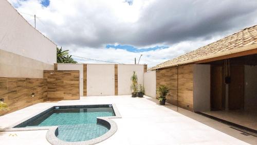 Bom Pastor House | NossoApê Guarua: Piscina | Churrasqueira | Ar-condicionado