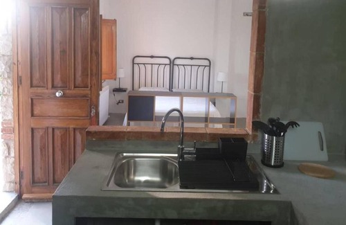 Torre Colonna-sperone Villa | Nut House apartment near the sea in a villa with garden