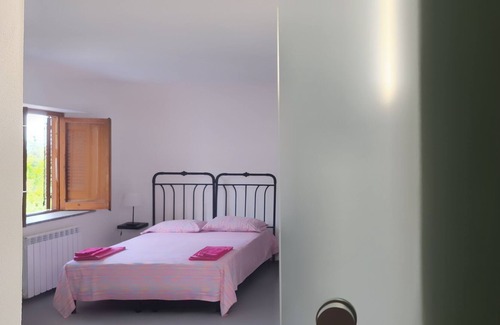 Torre Colonna-sperone Villa | Nut House apartment near the sea in a villa with garden
