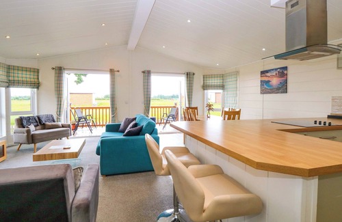 Stowmarket House | OAK TREE HOLIDAY LODGE, pet friendly, with open fire in Stonham Aspal