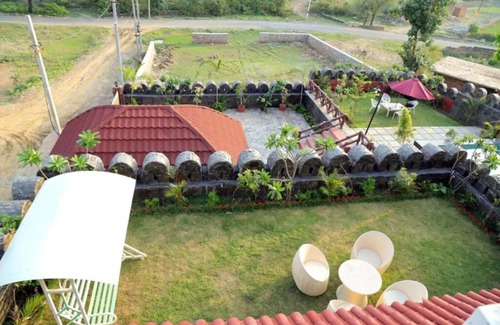Udaipur District Villa | Oakwood by Ebony Stays – 2BHK Getaway in Udaipur with Pool & Lounge Area