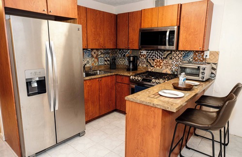 Bucana Apartment | Oasis in the South of the Island with Private Parking and Laundry. Pet friendly