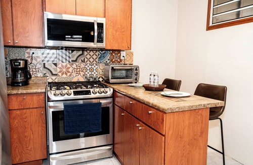 Bucana Apartment | Oasis in the South of the Island with Private Parking and Laundry. Pet friendly