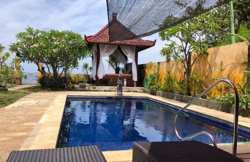 Banjartegehe House | Ocean Beachfront Villa Dini