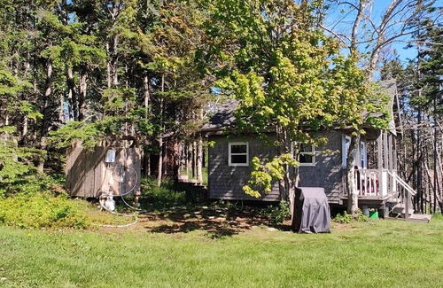 Cape Dauphin Cabin | Ocean front Bunkie.