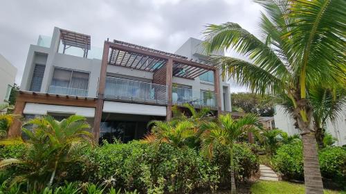 Pointe Aux Piments Apartment | Ocean Point Beach Front Apartment