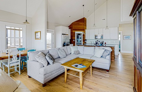 Carova Beach House | Ocean-view home with wrap-around deck, beach access, outdoor shower & cornhole