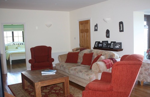 Caherdaniel House | Ocean views, walk to beach from Pairc An Dreolin on The Ring of Kerry.