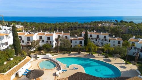 Albufeira Apartment | Ocean Vista Retreat with Beach & Pool Access by Drago Rentals