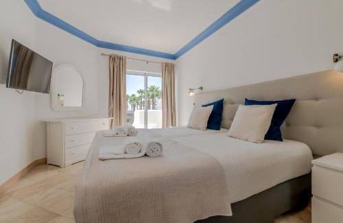 Albufeira Apartment | Ocean Vista Retreat with Beach & Pool Access by Drago Rentals