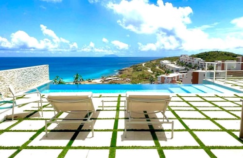 Indigo Bay Villa | Oceanfront Bliss: 3-Bedroom Escape with Breathtaking Views & Tropical Charm!