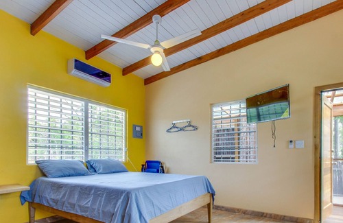 Dangriga Cabin | Oceanfront cabana with private beach, amazing sea view, hammock & partial AC