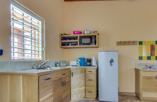 Dangriga Cabin | Oceanfront cabana with private beach, amazing sea view, hammock & partial AC