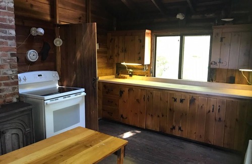 Southport House | Oceanfront Log Cabin with Dock on Southport Island - 7 acres with westerly views