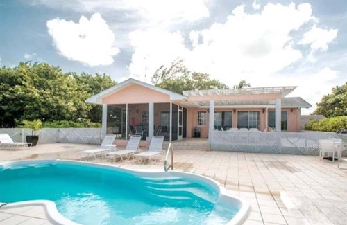 West Bay House | Oceanfront Oasis Home with cottage & pool