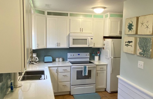 Pine Knoll Shores House | Oceanfront Townhome on semi private residential beach!