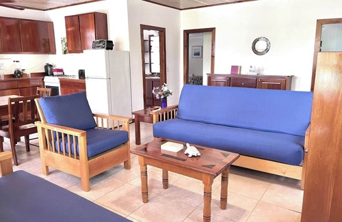 Caye Caulker Apartment | Oceanfront Unit w/dock/pool/AC-free paddle boards -2 bed, 1 bath sleeps 6