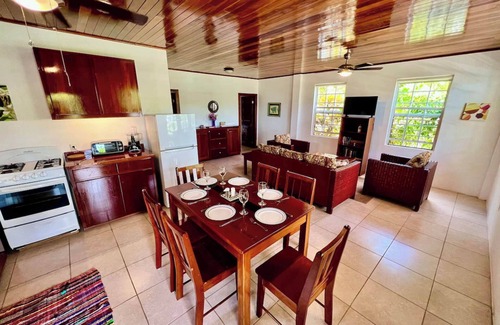 Caye Caulker Apartment | Oceanfront Unit w/dock/pool/AC-free paddle boards -2 bed, 1 bath sleeps 6