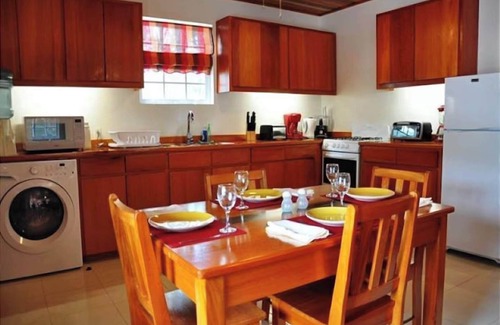 Caye Caulker Apartment | Oceanfront Unit w/dock/pool/AC-free paddle boards -2 bed, 1 bath sleeps 6