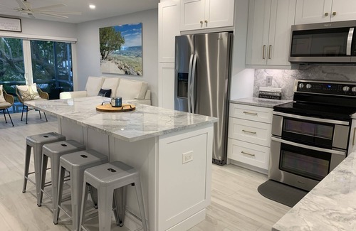 Key Largo House | Oceanside Key Largo Townhome, Private Marina, pools, Tennis and Golf Cart