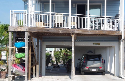 Cudjoe Key House | Oceanside Paradise: Kayaks, Free WiFi, A/C, Grill, Elevated Deck, 24hr Security