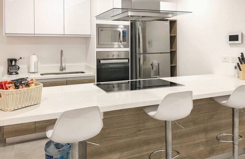 Centro Condo | Oceanview Rooftop Pool | Steps to 5th Ave & Beach