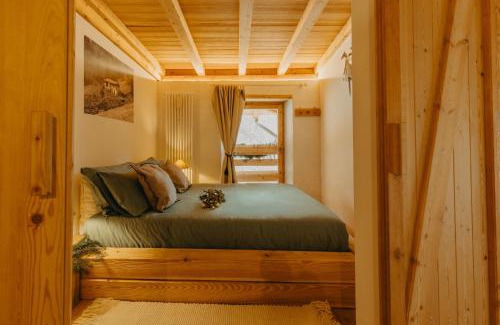 Sant'Orsola Terme Ski Chalet | Odomi maso nel bosco - Eleganza e Relax nella Natura