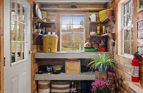 Bovina Center House | Off-Grid Tiny Cabin with Cozy Vintage Charm