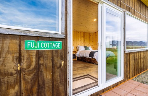 Whitehall Cottage | Off-grid tiny home in apple orchard with million-dollar mountain views!