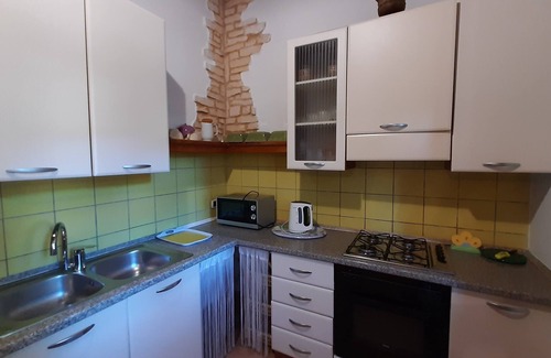 Sant'Antioco Cottage | Old and cozy typical stone house with terrace under the olive trees