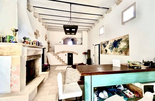 Lequile House | Old renovated millstone with jacuzzi