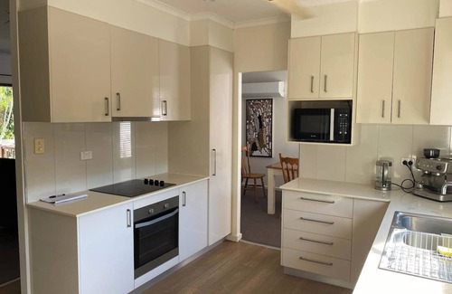 Rapid Creek House | Older typical darwin house 2 story - A/C and Fans to suit darwin climate - plenty or Ground level area to relax and give feelings of openness - Inground Spa to relax and entertain out back of pathed area