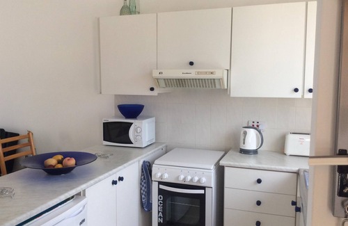 Paphos Apartment | Olympian pool view, 5 mins walk to seafront and beaches.