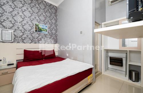 Malang Hotel | Omah Kalimosodo Mitra RedDoorz near Stasiun Malang Kota Baru